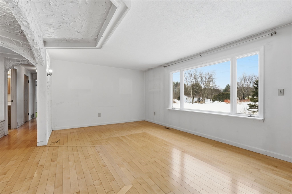 105 Pomeroy Lane Amherst, MA 01002 - Photo 13 of 40 a view of an empty room with a window