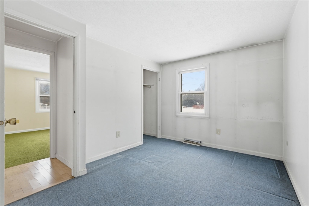 105 Pomeroy Lane Amherst, MA 01002 - Photo 23 of 40 an empty room with a empty space and a window