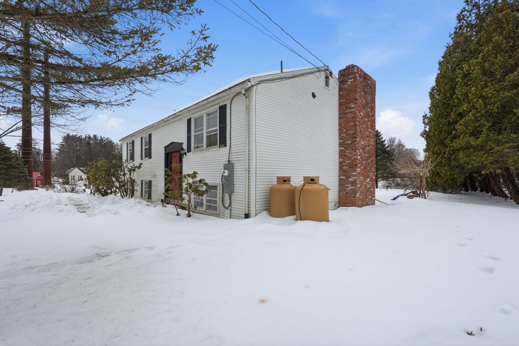 105 Pomeroy Lane Amherst, MA 01002 - Photo 3 of 40 a view of a house with backyard and a tree
