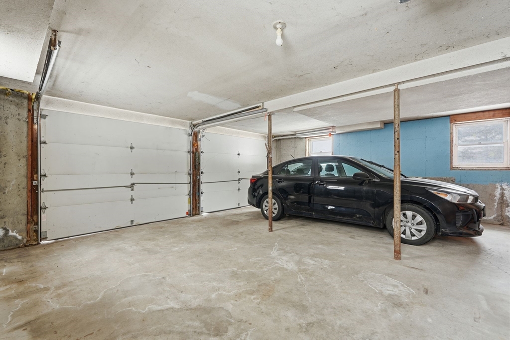 105 Pomeroy Lane Amherst, MA 01002 - Photo 34 of 40 a car parked in a garage