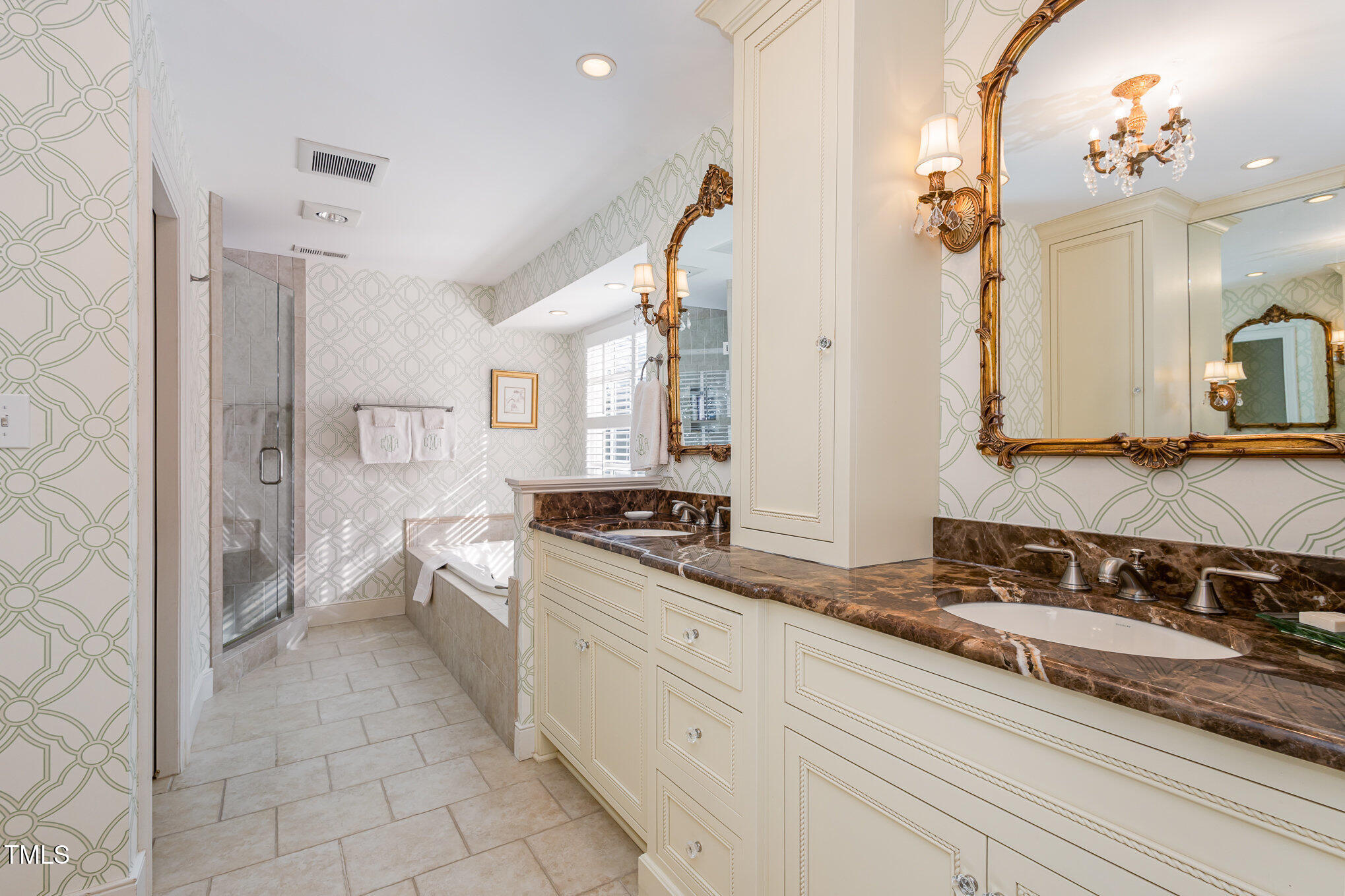 1420 Dogwood Lane Raleigh, NC 27607 - Photo 20 of 37 a spacious bathroom with a sink double vanity and a mirror