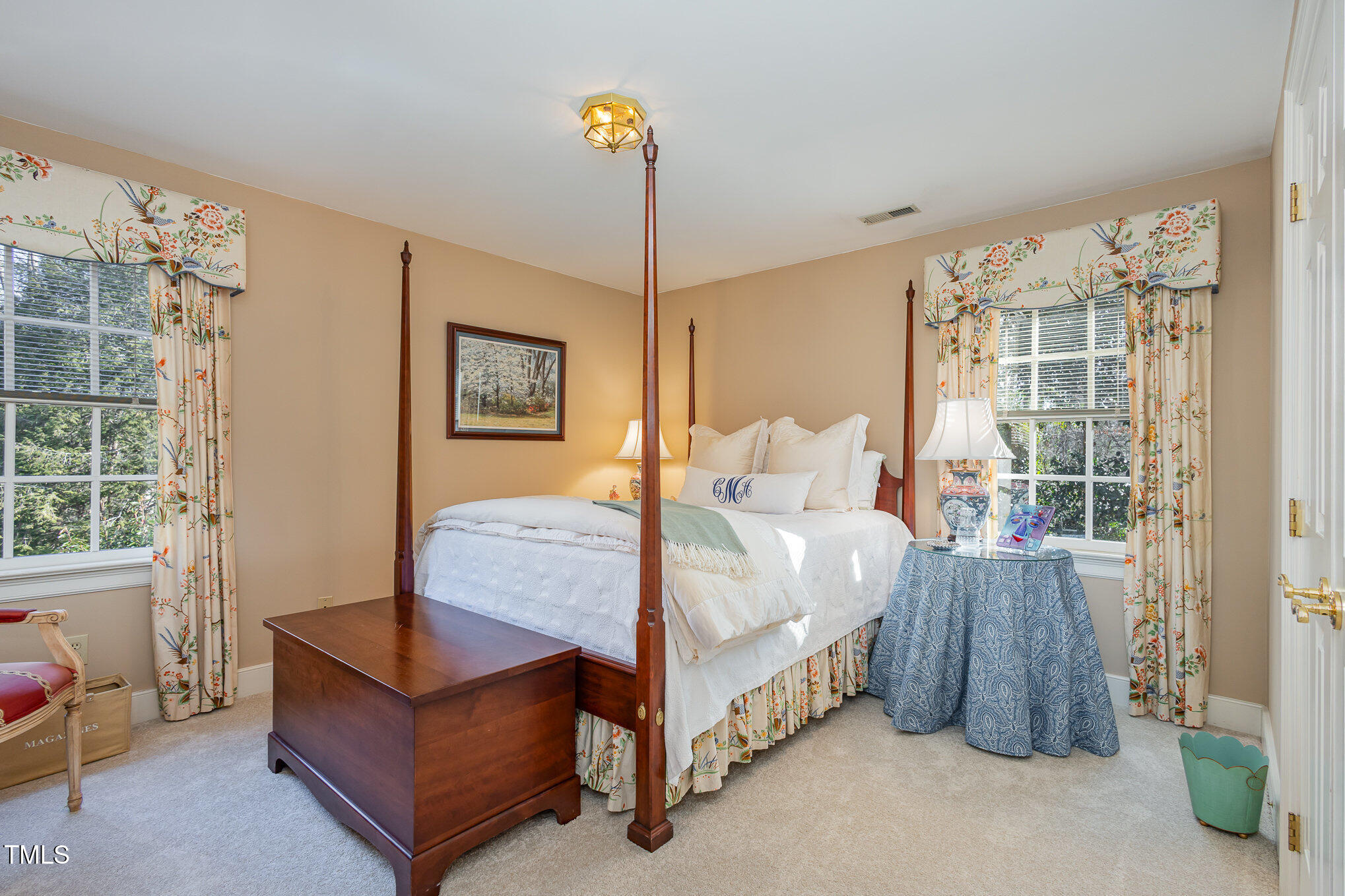 1420 Dogwood Lane Raleigh, NC 27607 - Photo 22 of 37 a bedroom with a bed and large window