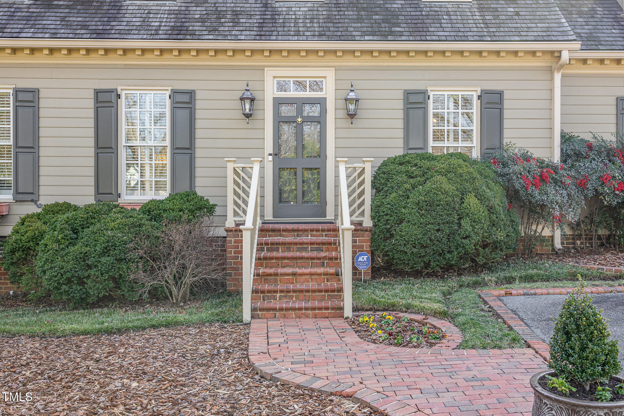1420 Dogwood Lane Raleigh, NC 27607 - Photo 5 of 37 a view of a house with potted plants