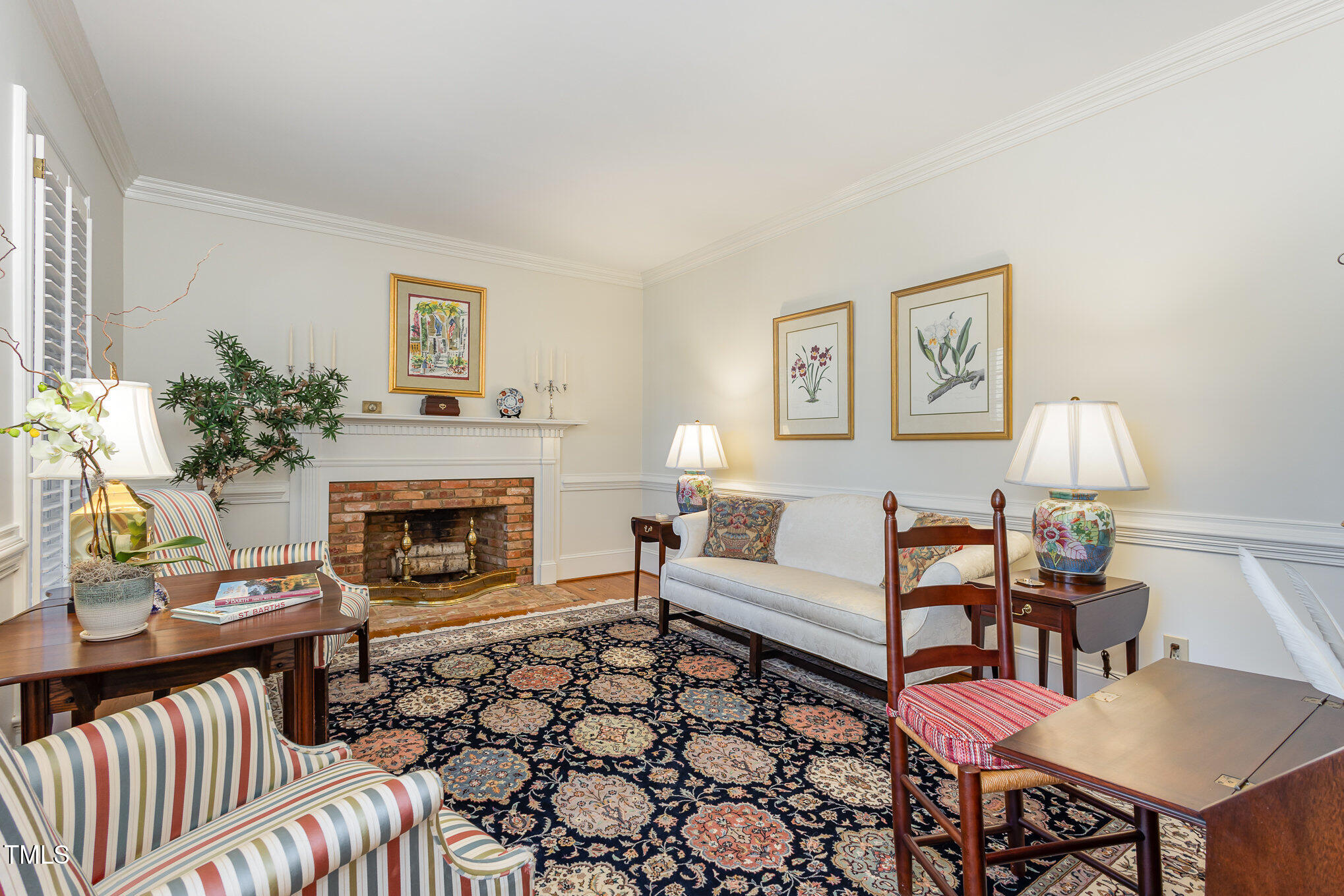 1420 Dogwood Lane Raleigh, NC 27607 - Photo 7 of 37 a living room with furniture and a fireplace
