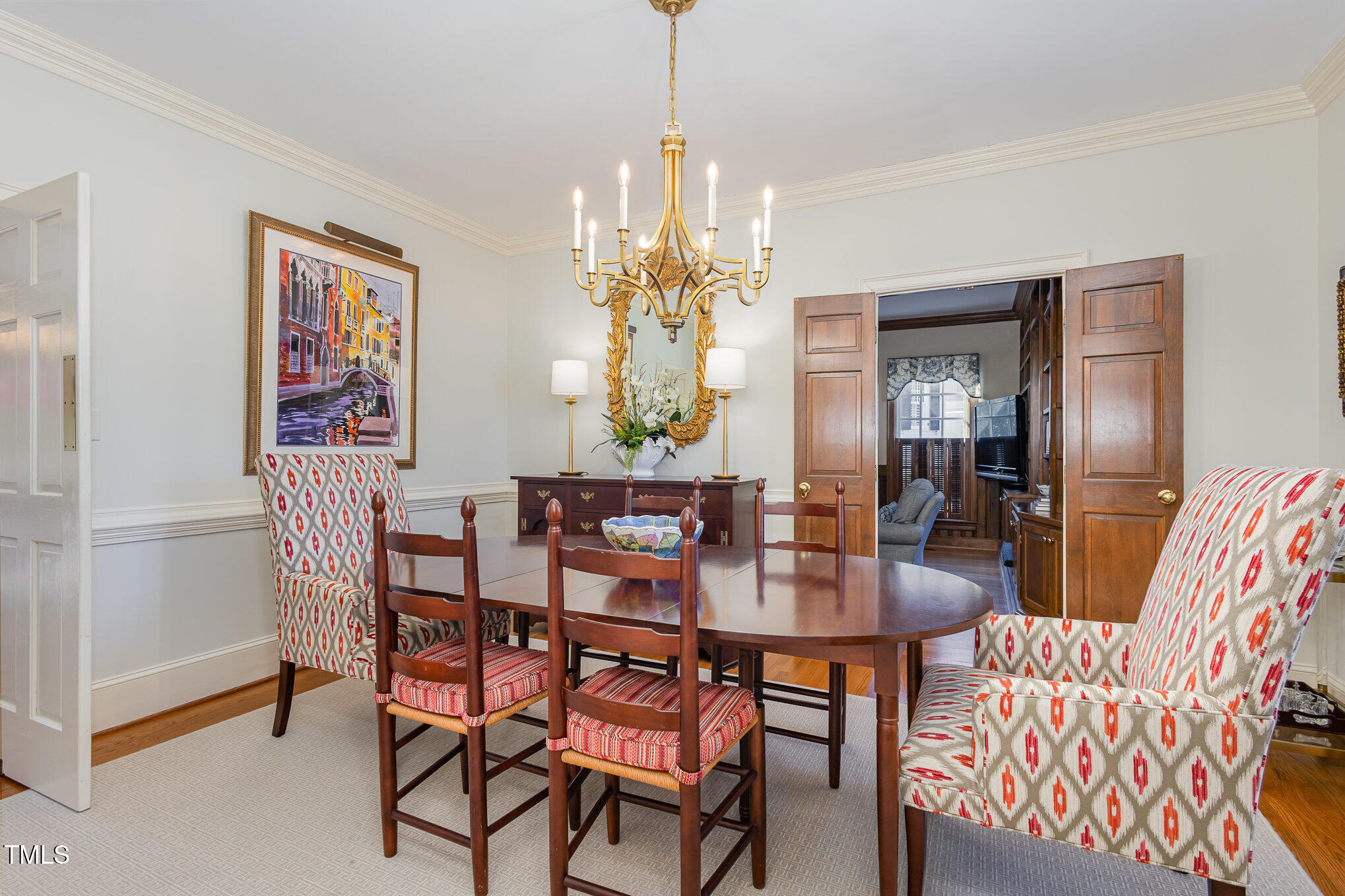 1420 Dogwood Lane Raleigh, NC 27607 - Photo 8 of 37 a dining room with furniture a chandelier and window