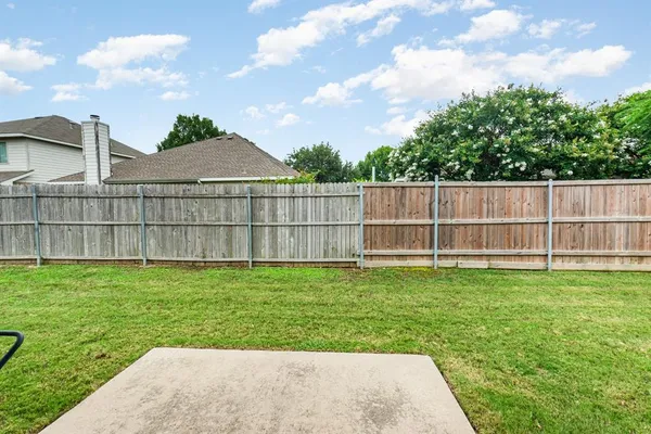a view of a backyard with a garden