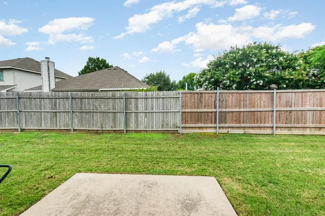 a view of a backyard with a garden