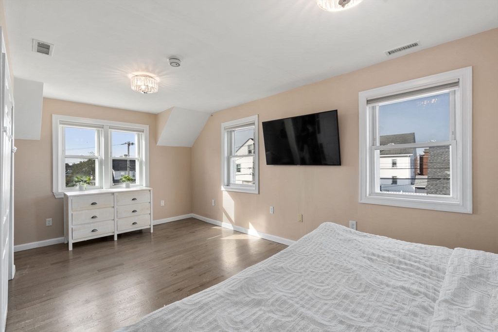 9 Marshall Street Winthrop, MA 02152 - Photo 13 of 34 a view of a livingroom with wooden floor and windows