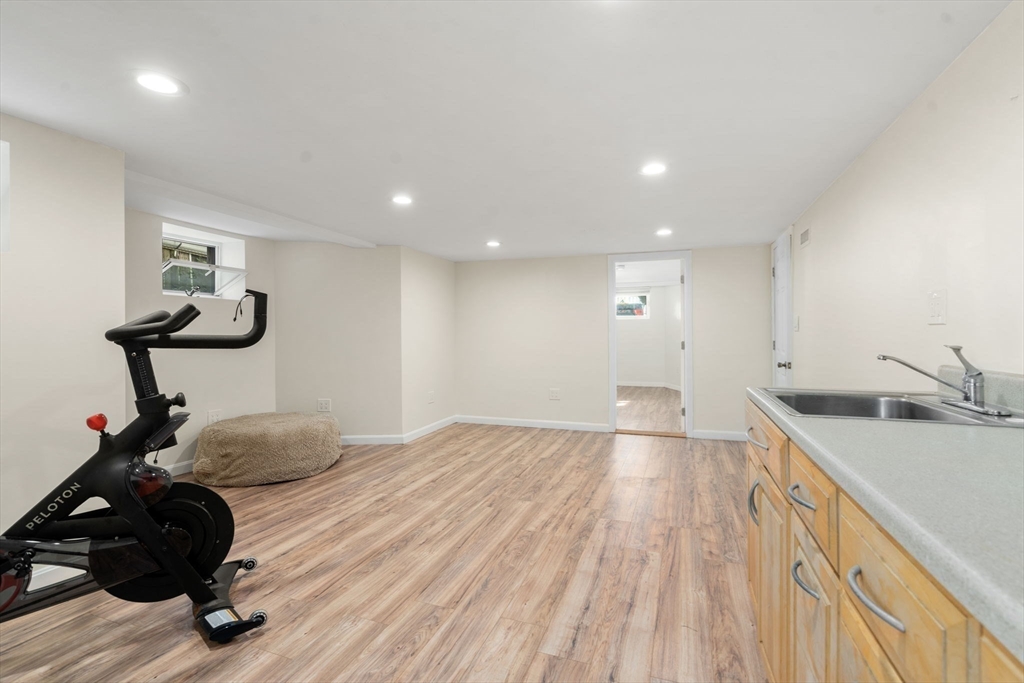 9 Marshall Street Winthrop, MA 02152 - Photo 22 of 34 a view of a room with wooden floor and gym equipment