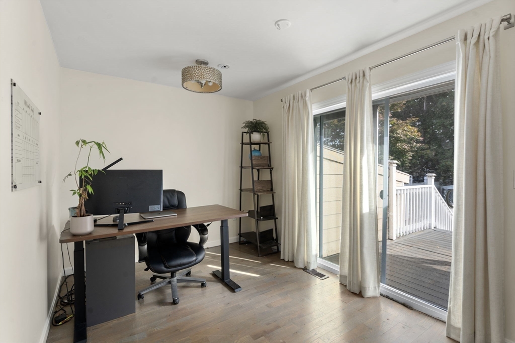 9 Marshall Street Winthrop, MA 02152 - Photo 23 of 34 a view of a workspace with furniture and a window