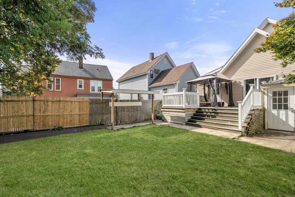 9 Marshall Street Winthrop, MA 02152 - Photo 29 of 34 a view of a house with a yard and sitting area