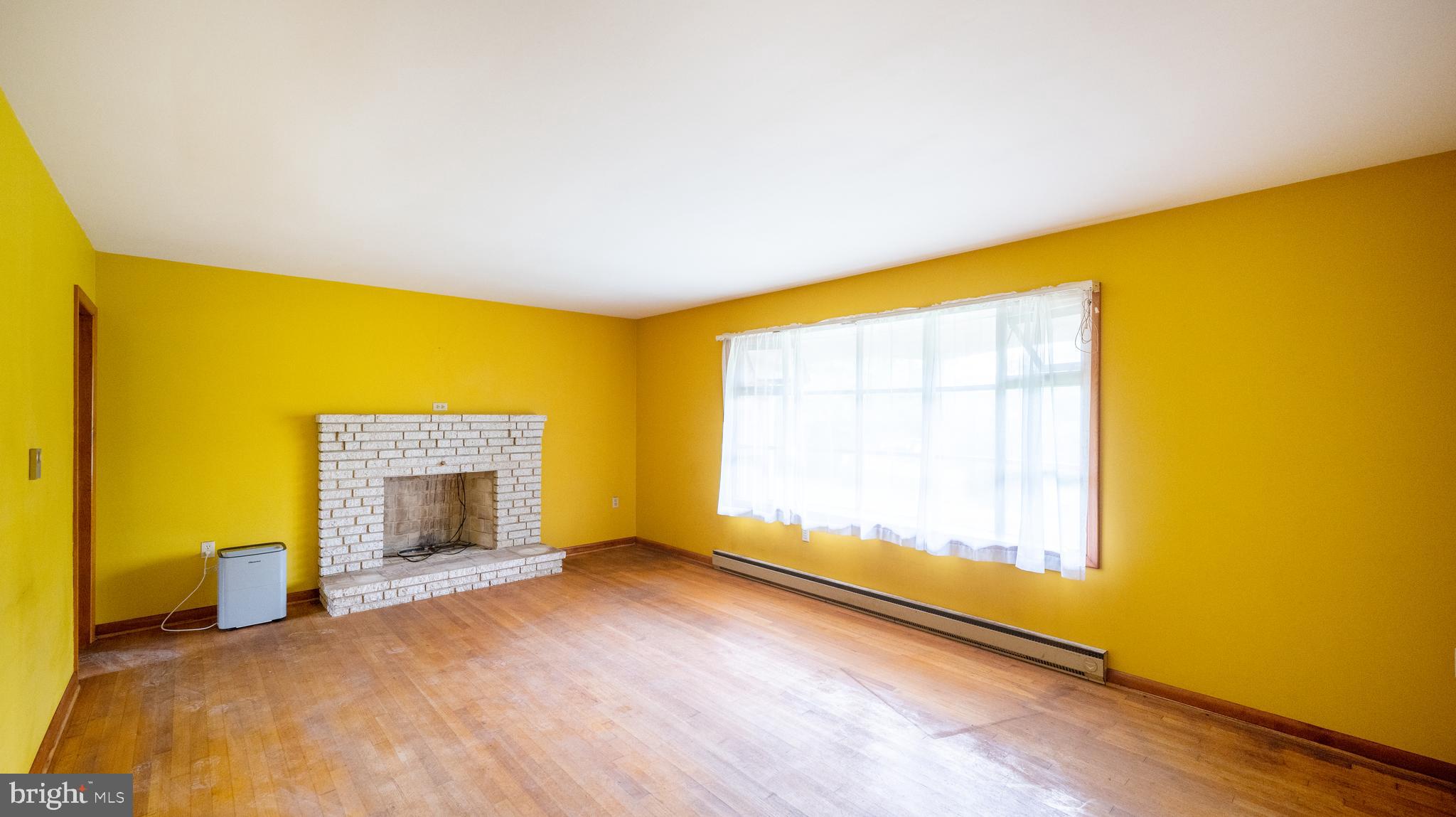 5995 Grove Hill Road Frederick, MD 21703 - Photo 10 of 34 HARDWOOD FLOORS/FIREPLACE