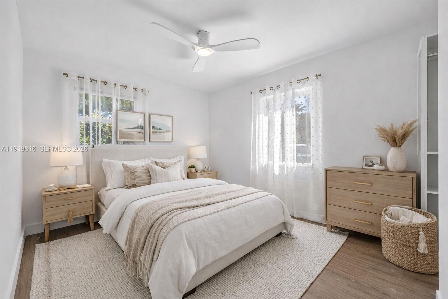 6735 Southwest 51st Street Miami, FL 33155 - Photo 13 of 34 a bedroom with a bed and a window