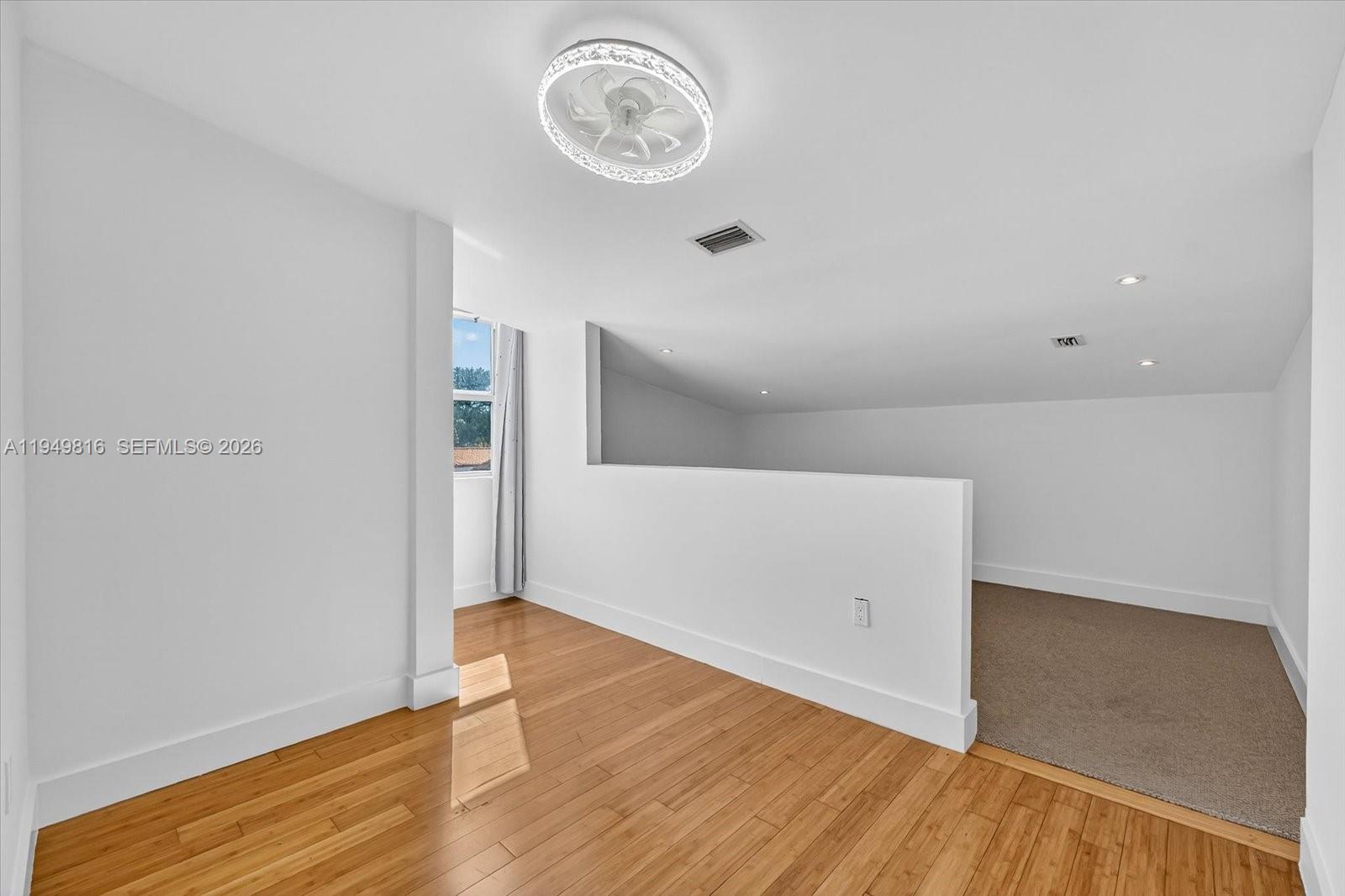 6735 Southwest 51st Street Miami, FL 33155 - Photo 21 of 34 a view of a room with wooden floor