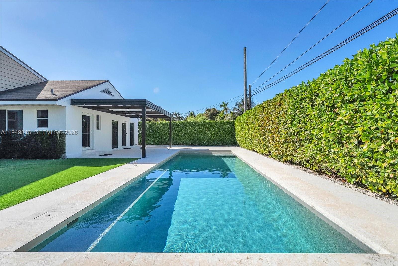 6735 Southwest 51st Street Miami, FL 33155 - Photo 23 of 34 a view of house with swimming pool