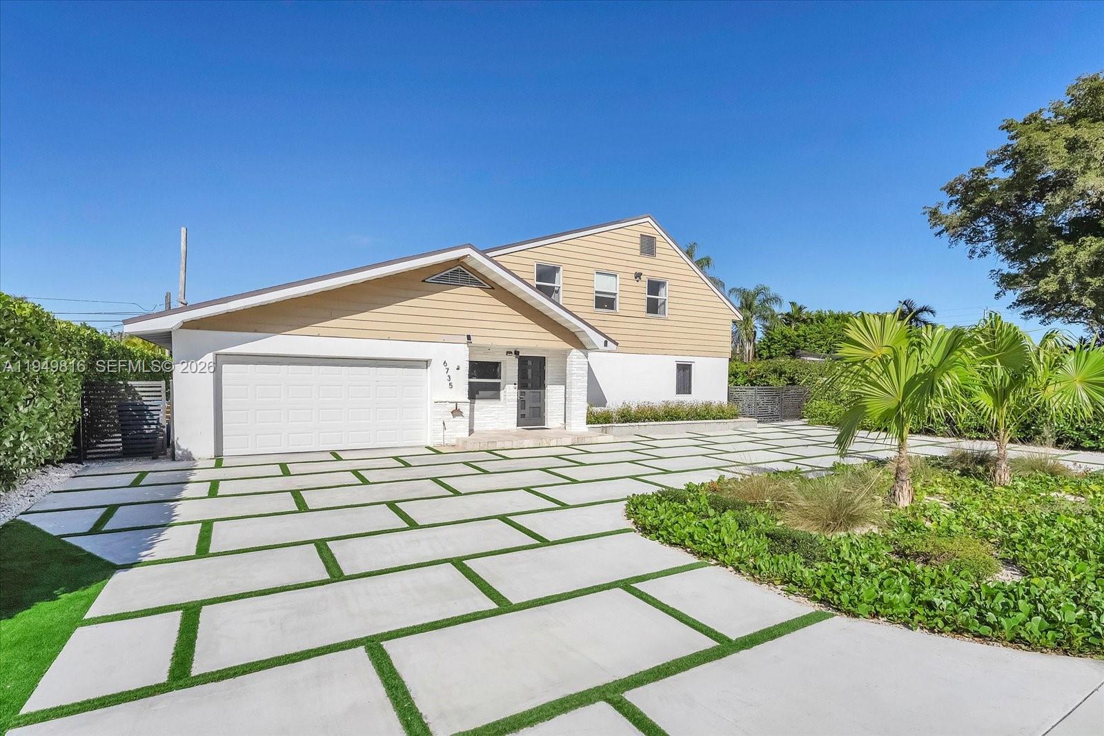 6735 Southwest 51st Street Miami, FL 33155 - Photo 26 of 34 a view of front of house with a yard