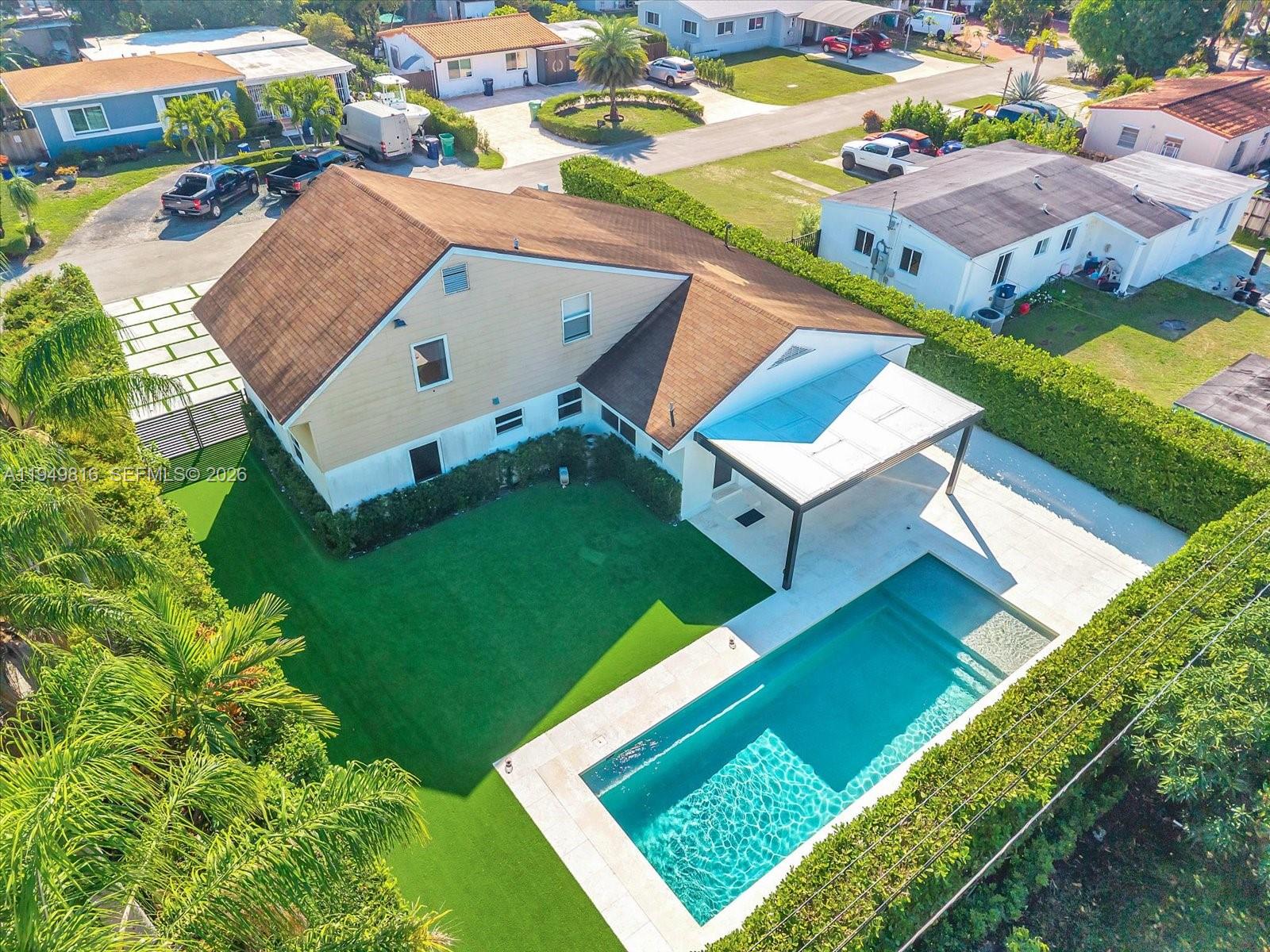 6735 Southwest 51st Street Miami, FL 33155 - Photo 29 of 34 an aerial view of residential houses with outdoor space