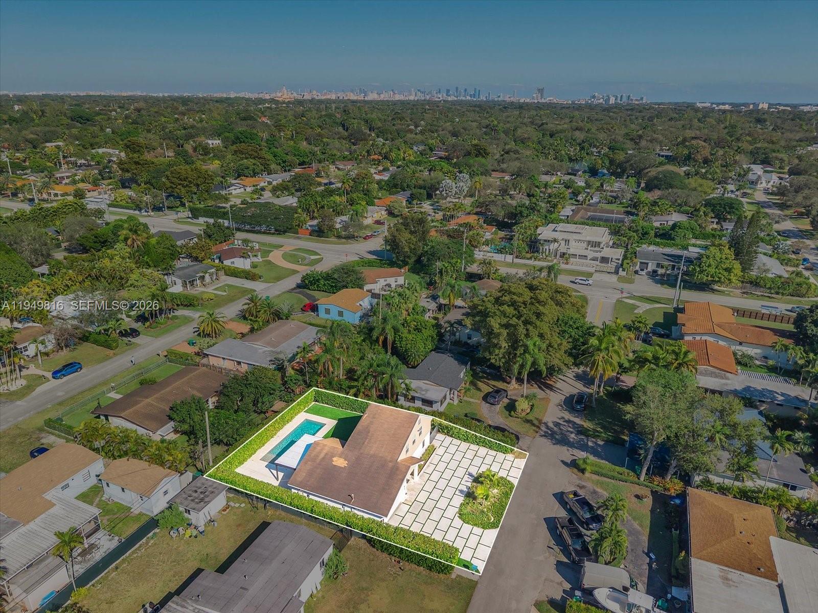 6735 Southwest 51st Street Miami, FL 33155 - Photo 34 of 34 an aerial view of residential houses with outdoor space and trees