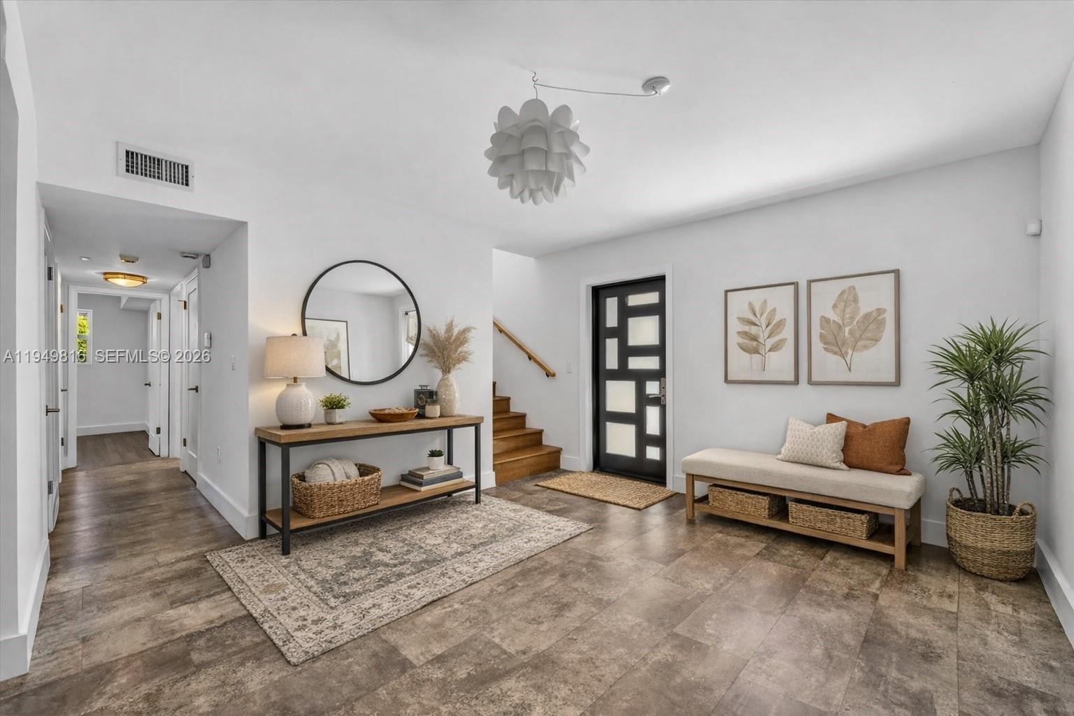 6735 Southwest 51st Street Miami, FL 33155 - Photo 6 of 34 a living room with furniture