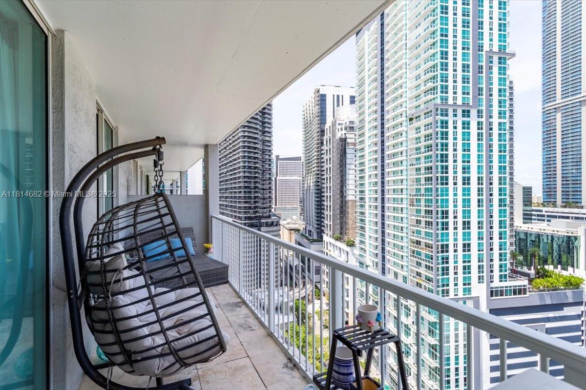 1250 South Miami Avenue, Unit 2208 Miami, FL 33130 - Photo 17 of 28 a view of balcony with wooden floor