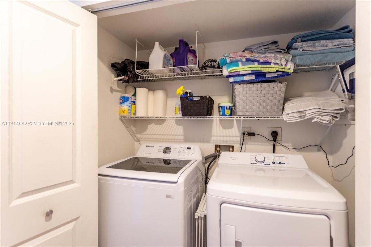 1250 South Miami Avenue, Unit 2208 Miami, FL 33130 - Photo 18 of 28 a utility room with dryer and washer