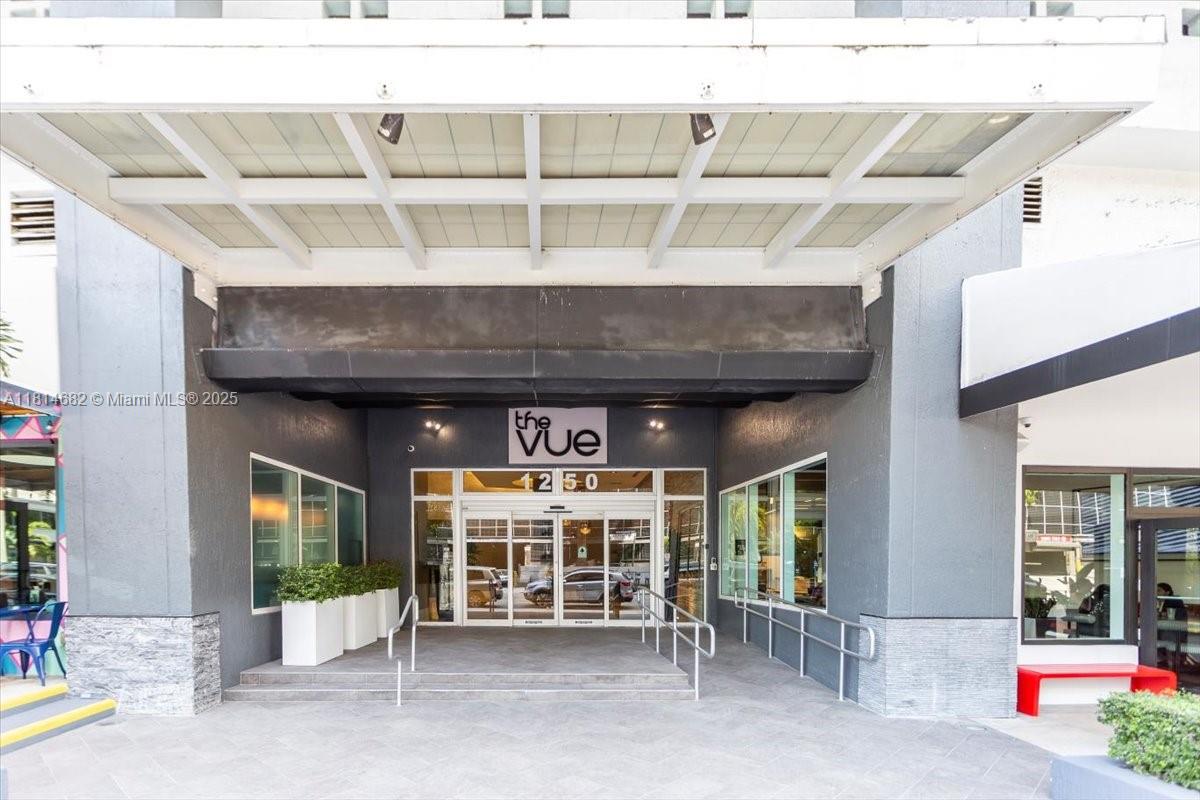 1250 South Miami Avenue, Unit 2208 Miami, FL 33130 - Photo 19 of 28 a view of a chair and table in front of house