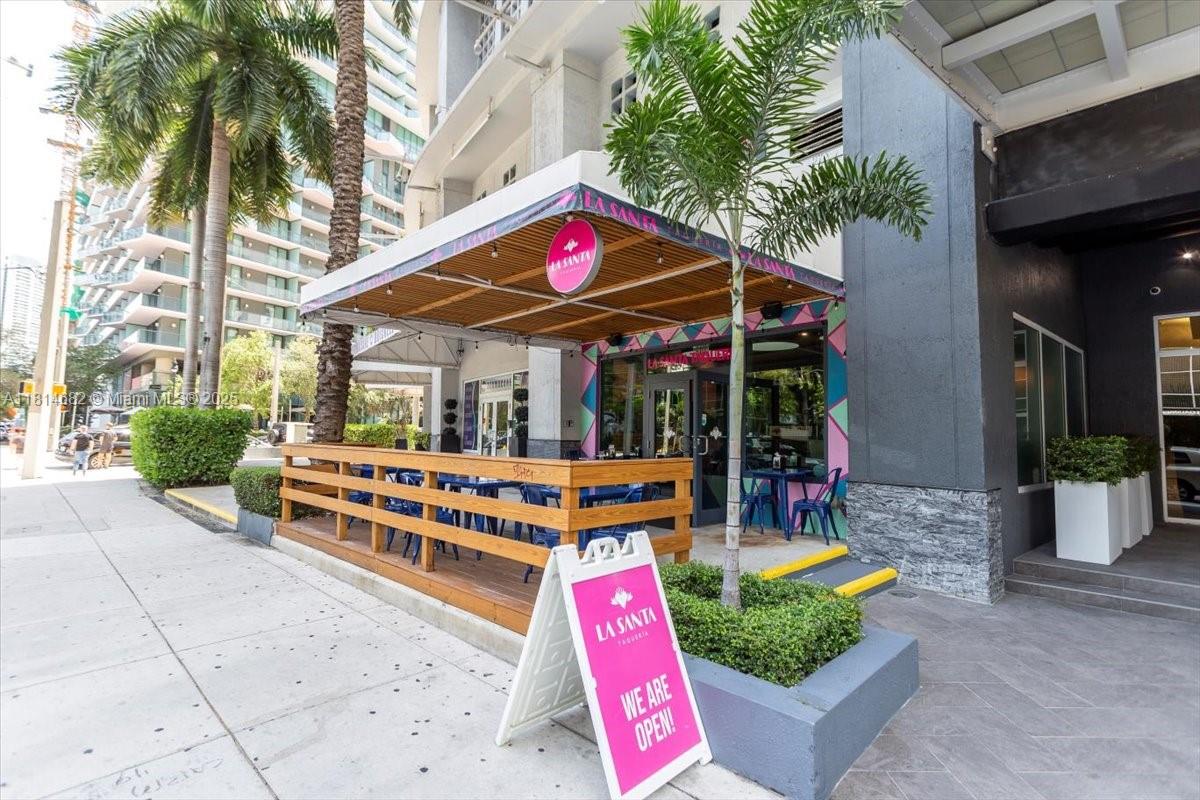 1250 South Miami Avenue, Unit 2208 Miami, FL 33130 - Photo 20 of 28 a sign that is sitting in front of a building