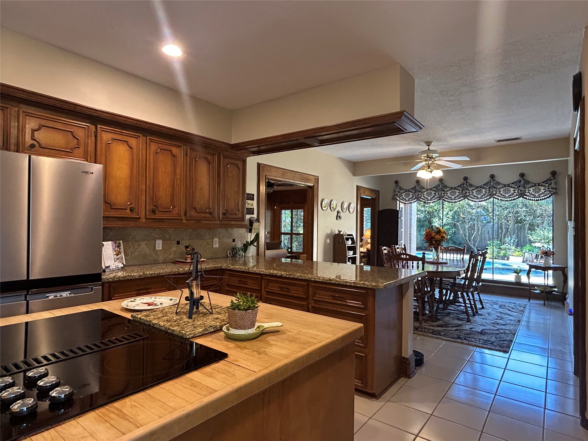 9547 Enstone Circle Spring, TX 77379 - Photo 11 of 45 Brand new tempered windows span the Breakfast Rm wall, offering a fabulous view of the Pool!