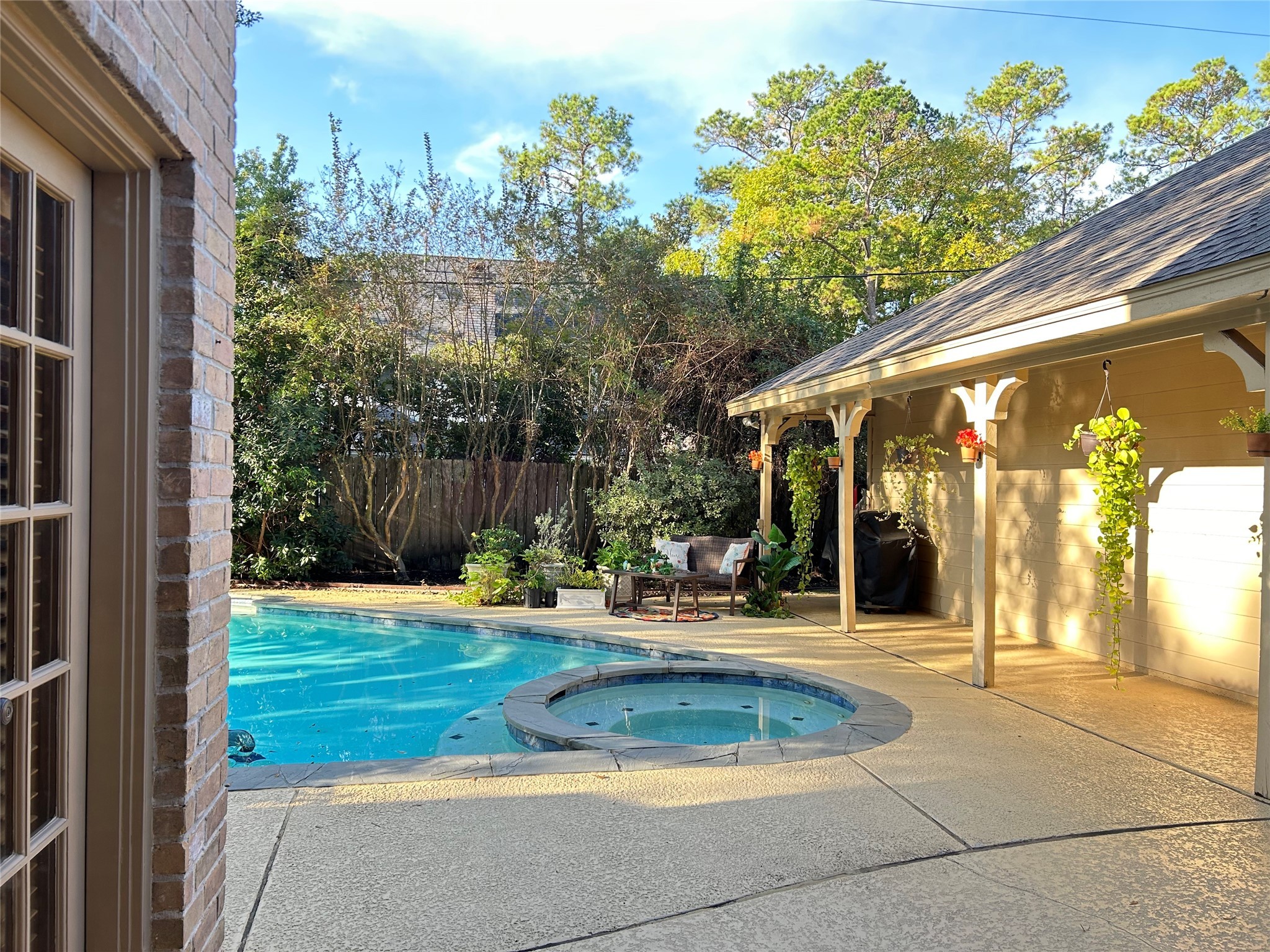9547 Enstone Circle Spring, TX 77379 - Photo 17 of 45 a view of a house with backyard and sitting area