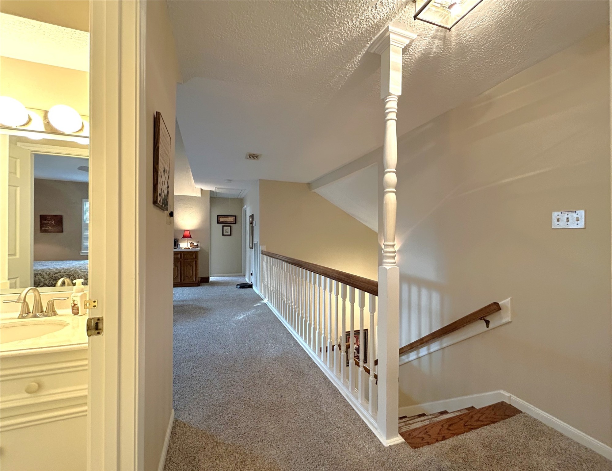 9547 Enstone Circle Spring, TX 77379 - Photo 27 of 45 a view of a hallway with a white walls