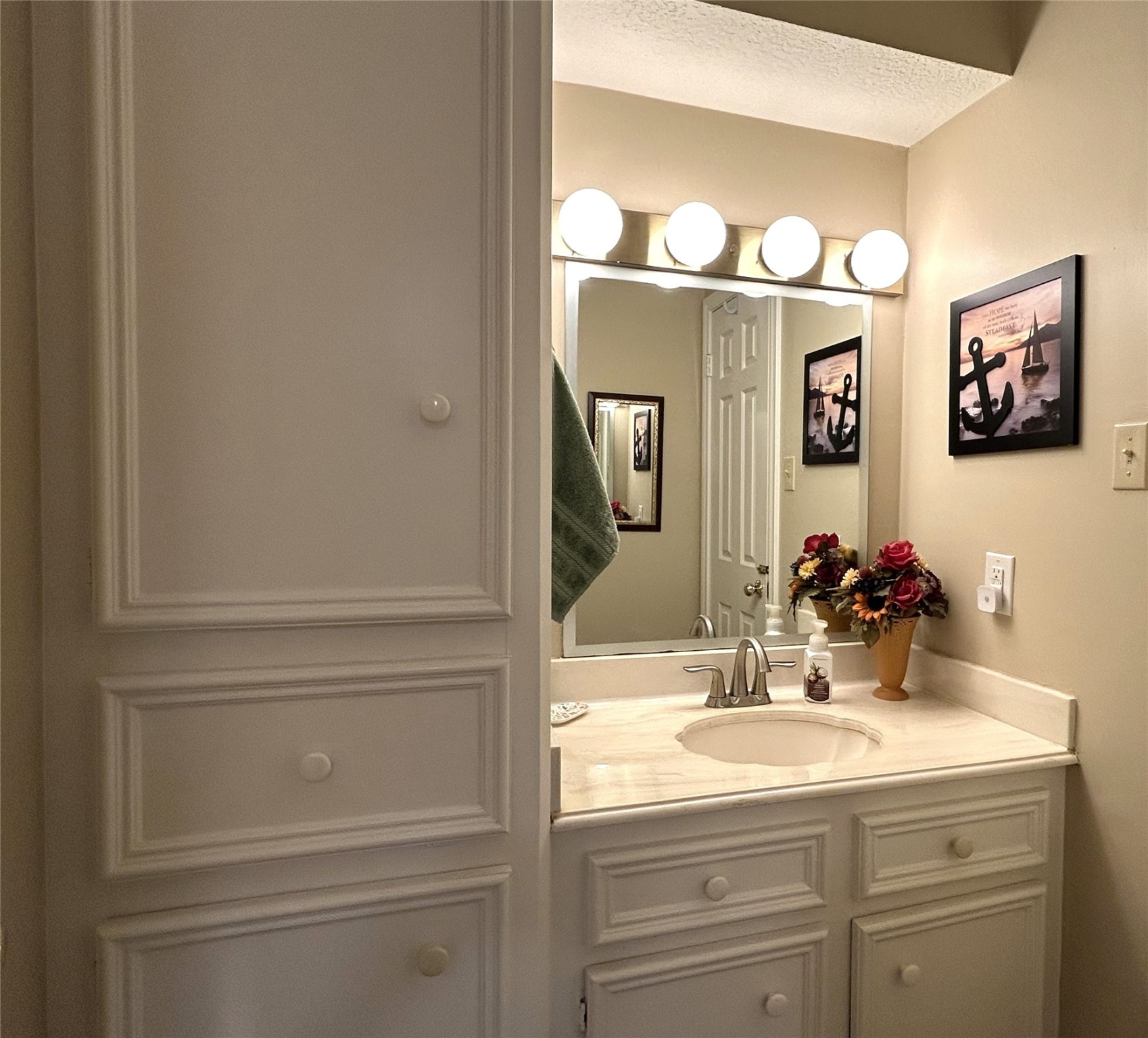 9547 Enstone Circle Spring, TX 77379 - Photo 31 of 45 a bathroom with a sink and a mirror