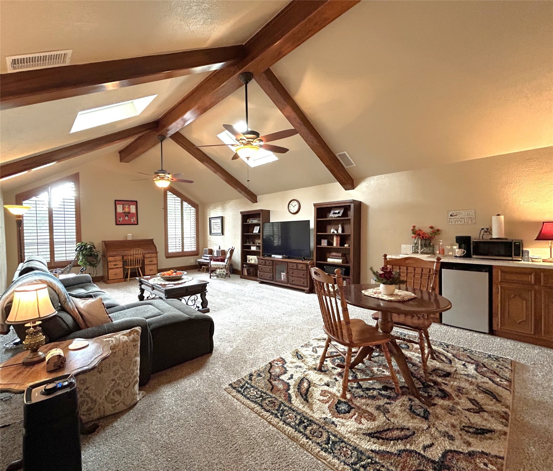 9547 Enstone Circle Spring, TX 77379 - Photo 32 of 45 a living room with furniture and kitchen view