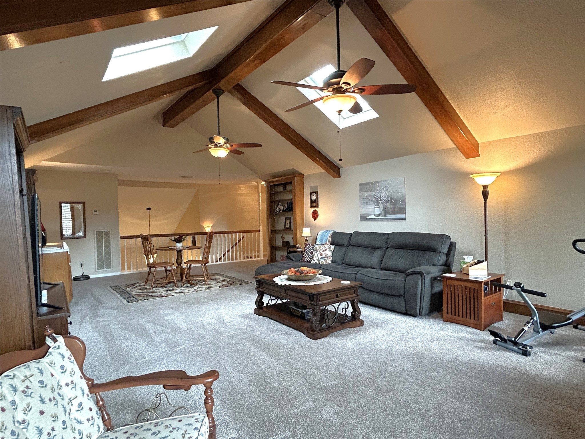 9547 Enstone Circle Spring, TX 77379 - Photo 34 of 45 a living room with furniture and a chandelier