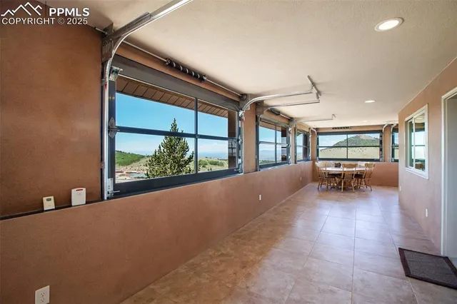 a view of livingroom with furniture and window