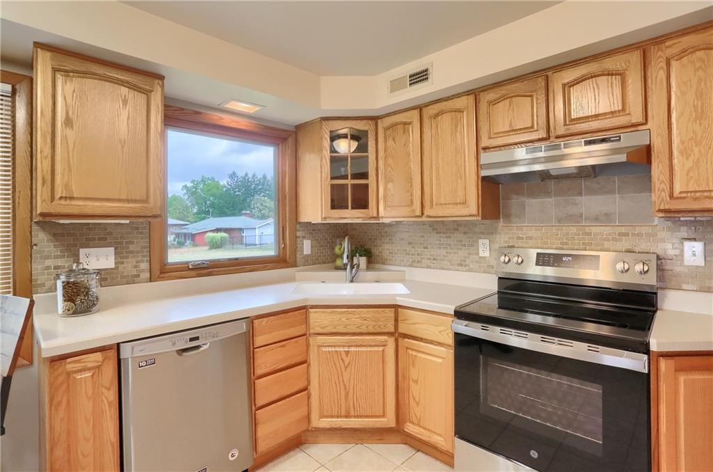 436 Blackhawk Road Beaver Falls, PA 15010 - Photo 15 of 48 KItchen with newer dishwasher and electric stove