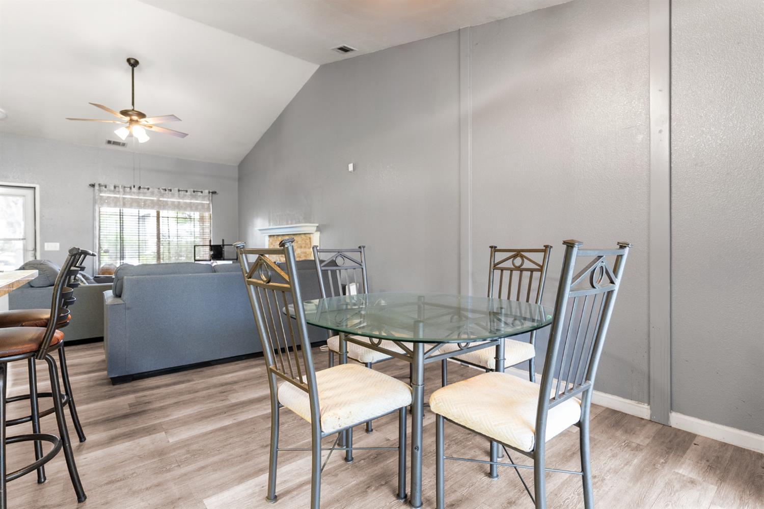 600 Sears Drive Patterson, CA 95363 - Photo 15 of 44 a view of a dining room with furniture and wooden floor