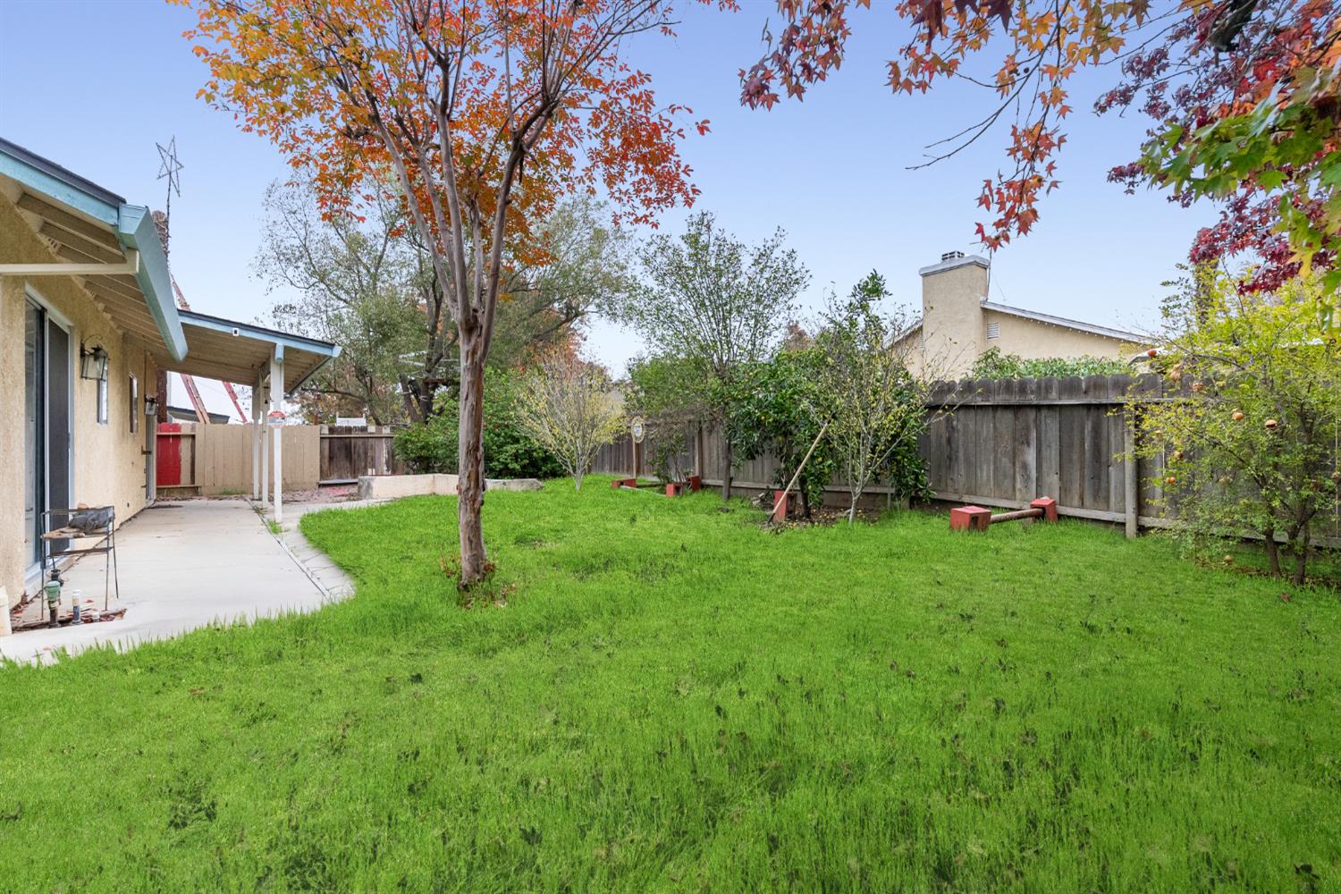 600 Sears Drive Patterson, CA 95363 - Photo 39 of 44 a view of a house with a yard and tree s