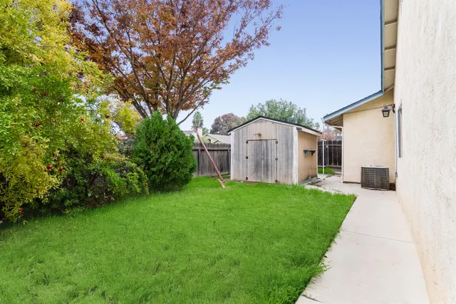 a view of a back yard of the house