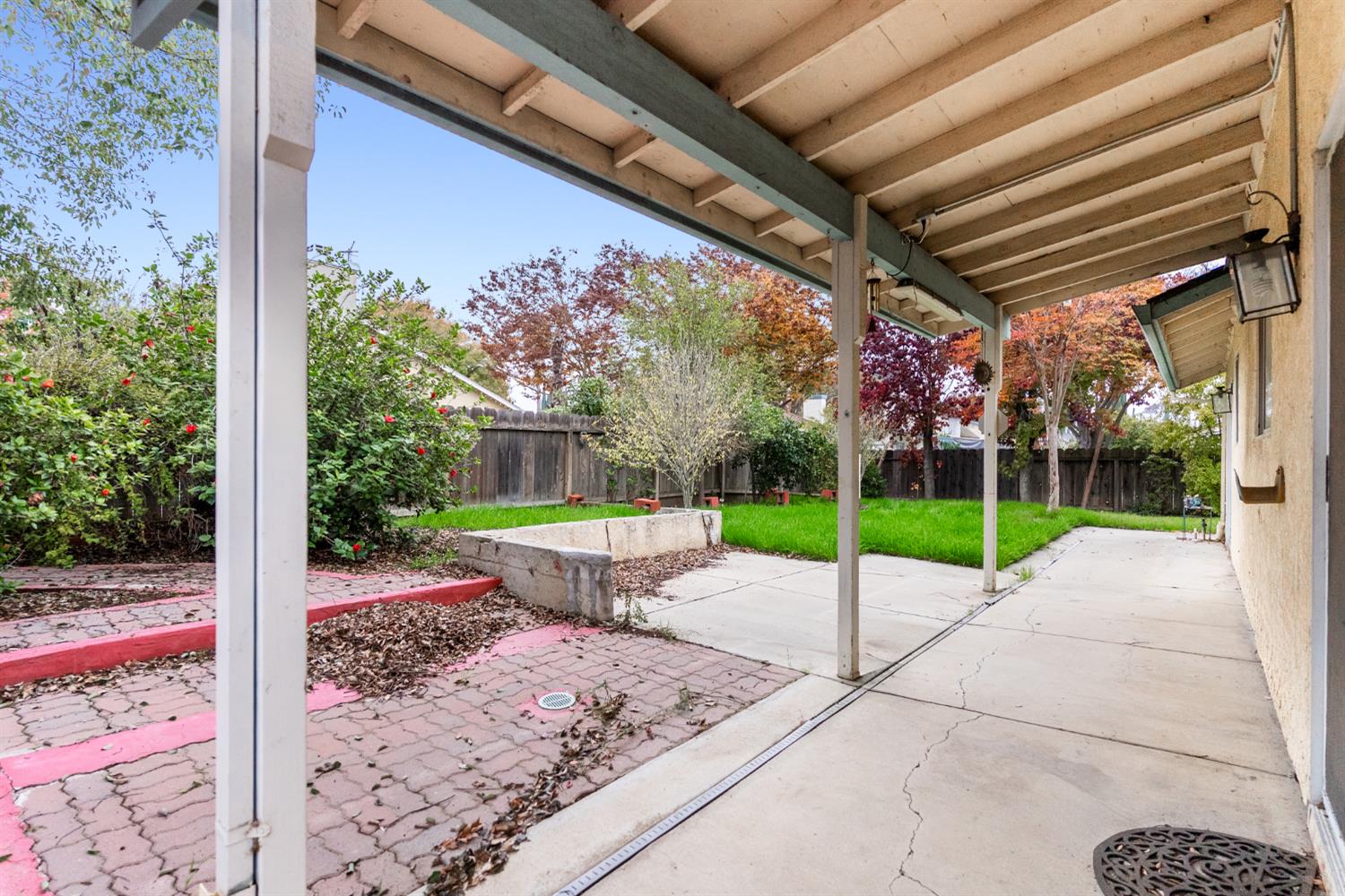 600 Sears Drive Patterson, CA 95363 - Photo 42 of 44 a view of a porch with a table and chairs