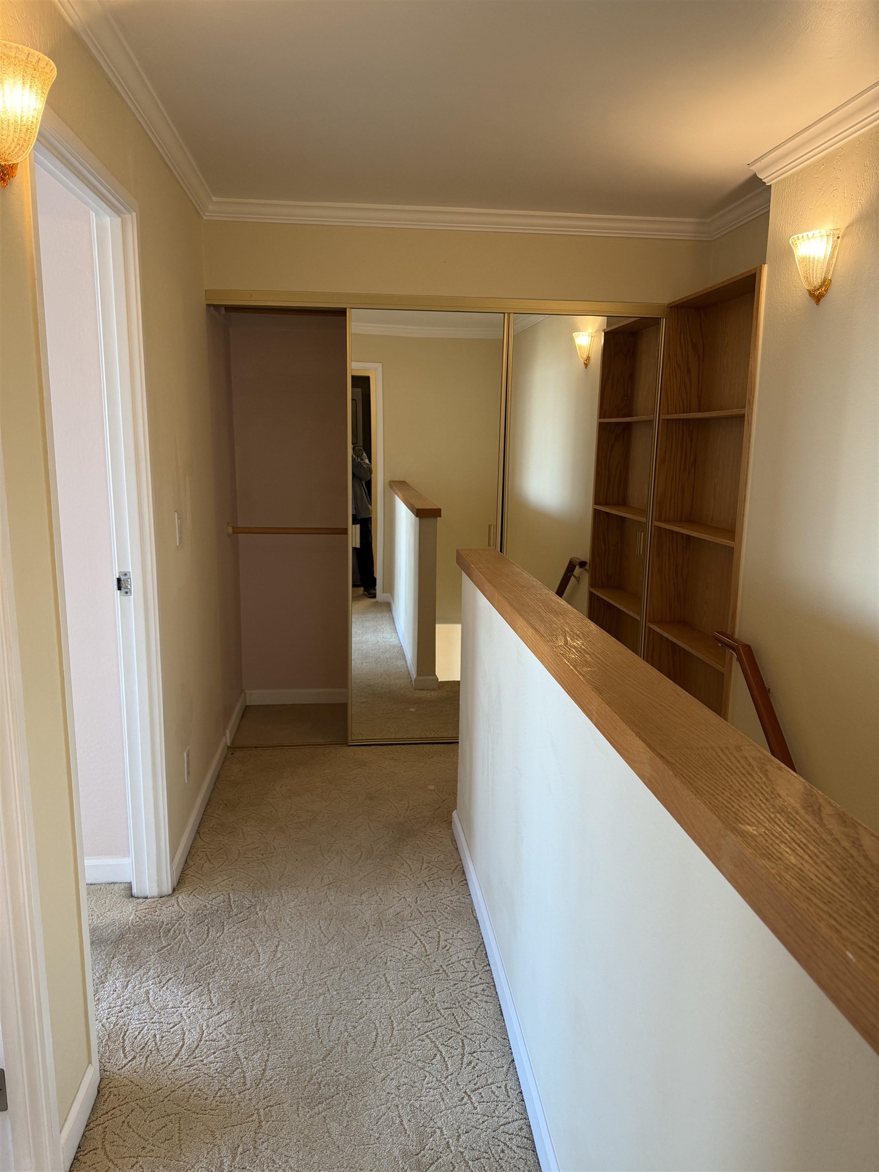 801 Franklin Street, Unit 1239 Oakland, CA 94607 - Photo 15 of 15 Corridor featuring light colored carpet, an upstairs landing, and crown molding