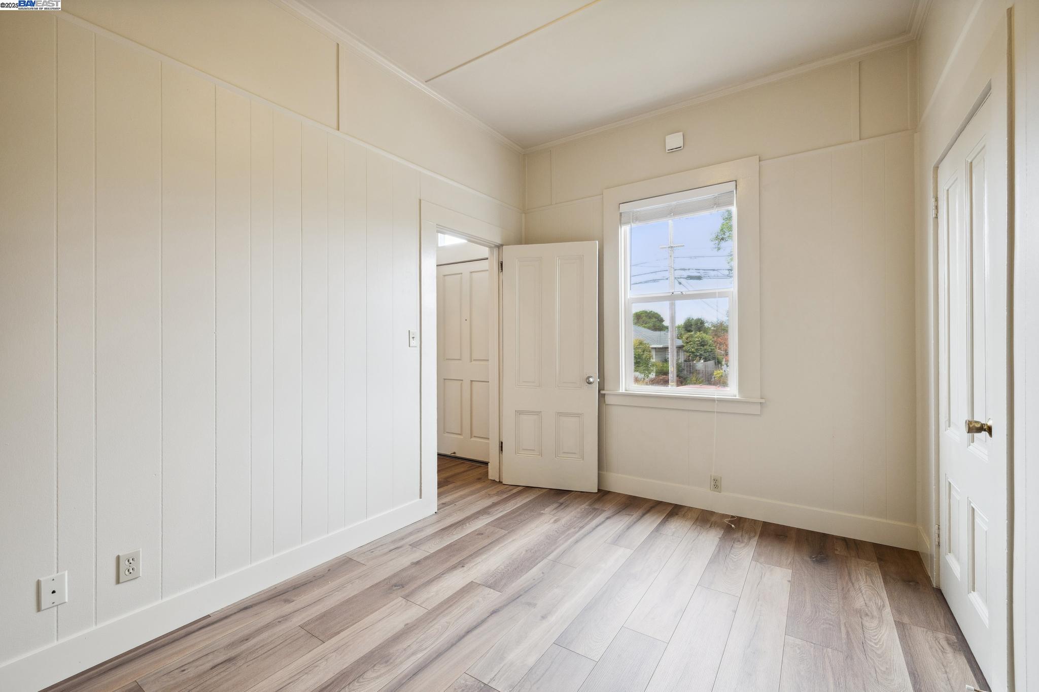 1820 3rd Street Alameda, CA 94501 - Photo 44 of 60 a view of a room with wooden floor and window