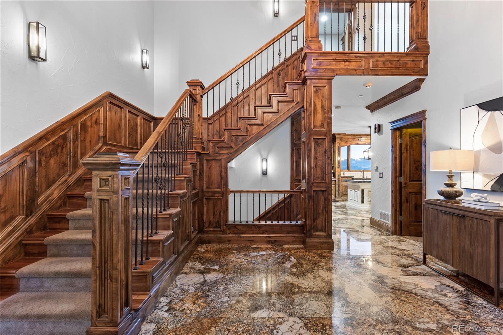 100 Halter Way Evergreen, CO 80439 - Photo 11 of 40 a view of entryway livingroom and hall with wooden floor