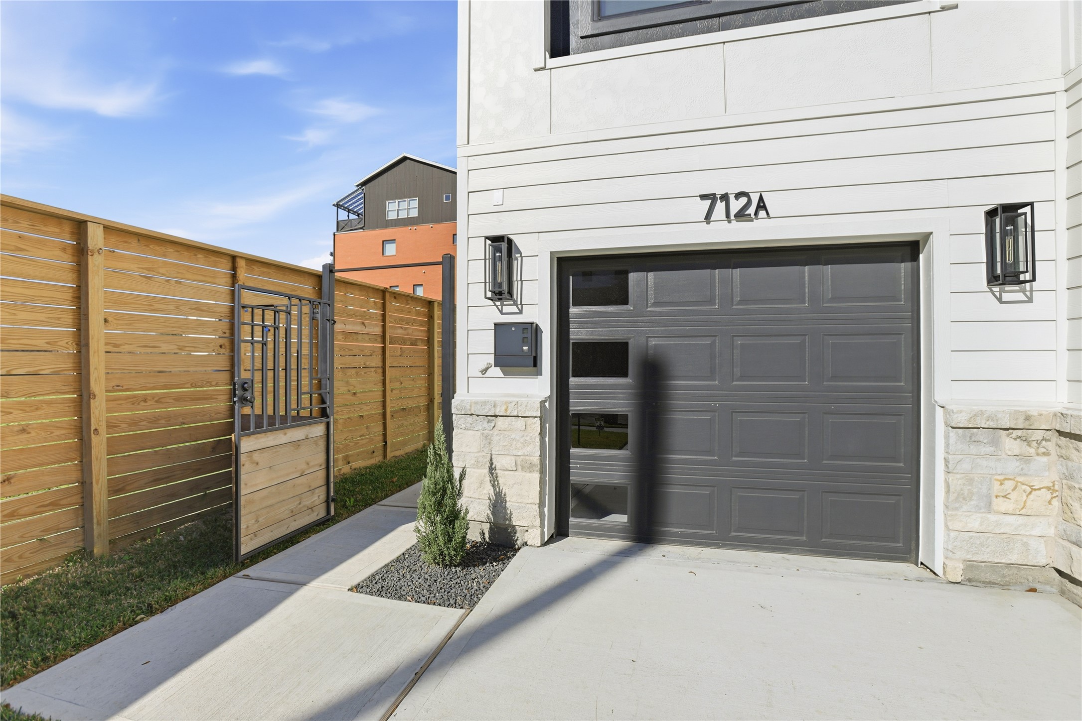 712 Delano Street, Unit A Houston, TX 77003 - Photo 2 of 35 a view of front door and potted plants