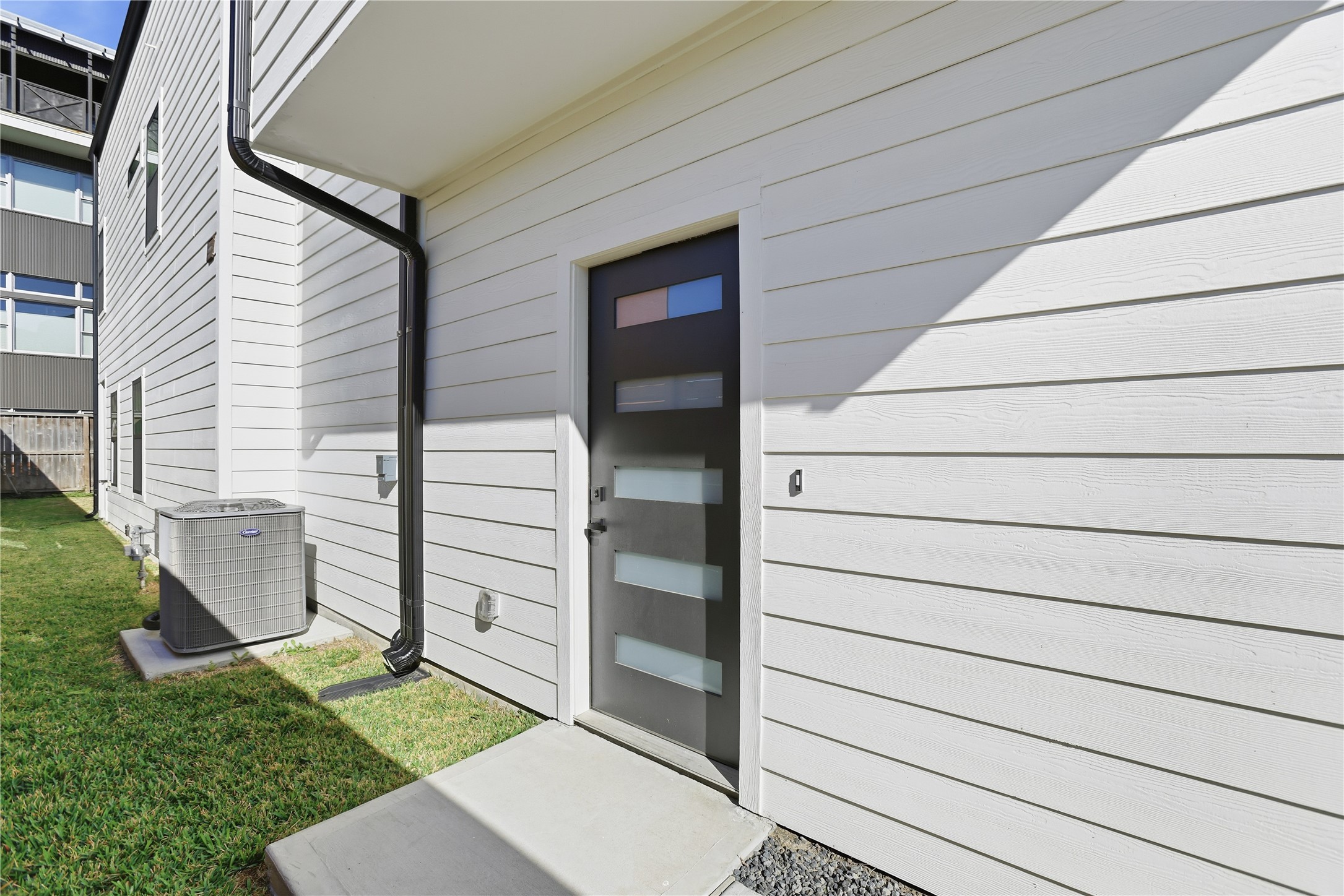 712 Delano Street, Unit A Houston, TX 77003 - Photo 28 of 35 a view of front door and a window
