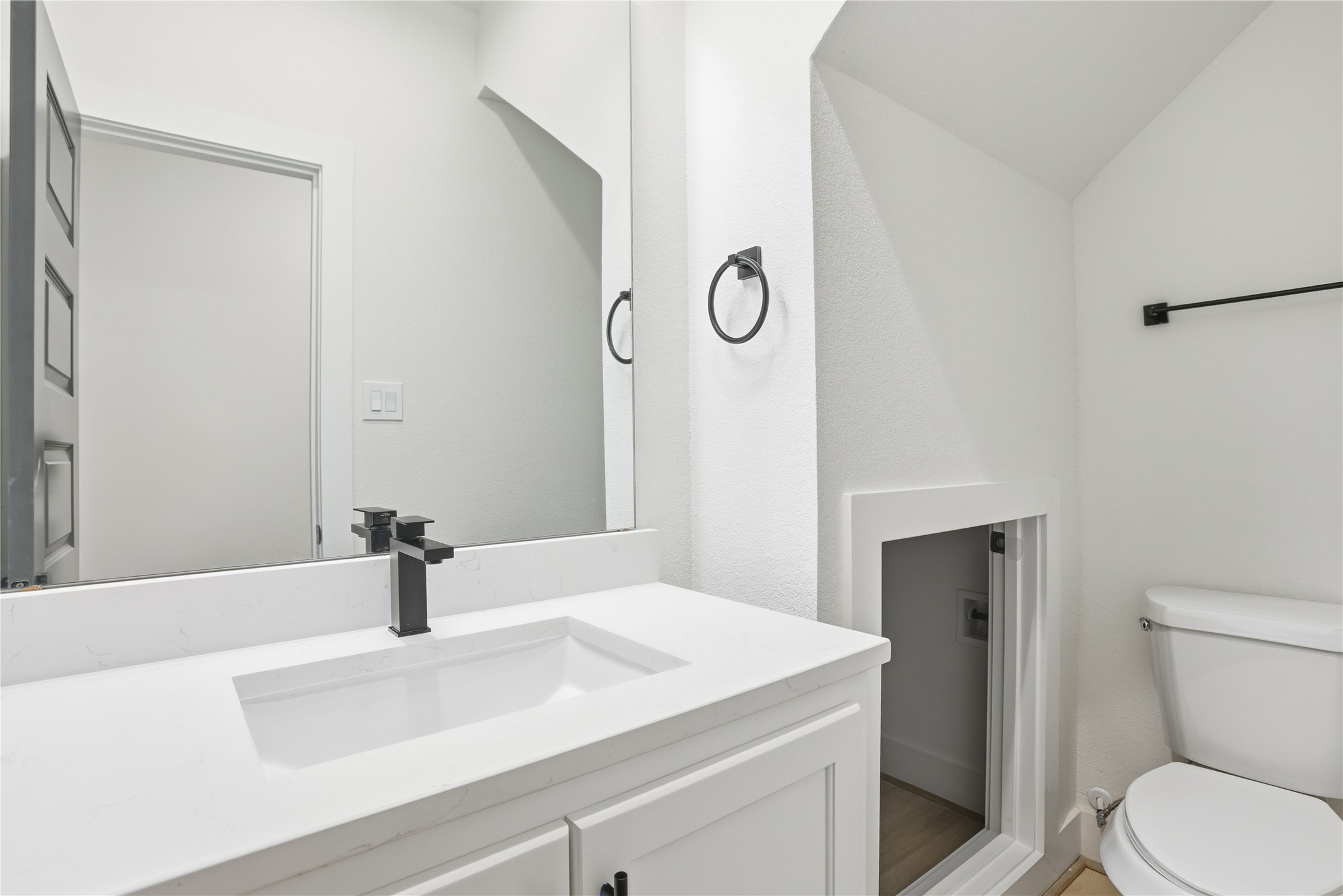 712 Delano Street, Unit A Houston, TX 77003 - Photo 3 of 35 a bathroom with a sink and a toilet