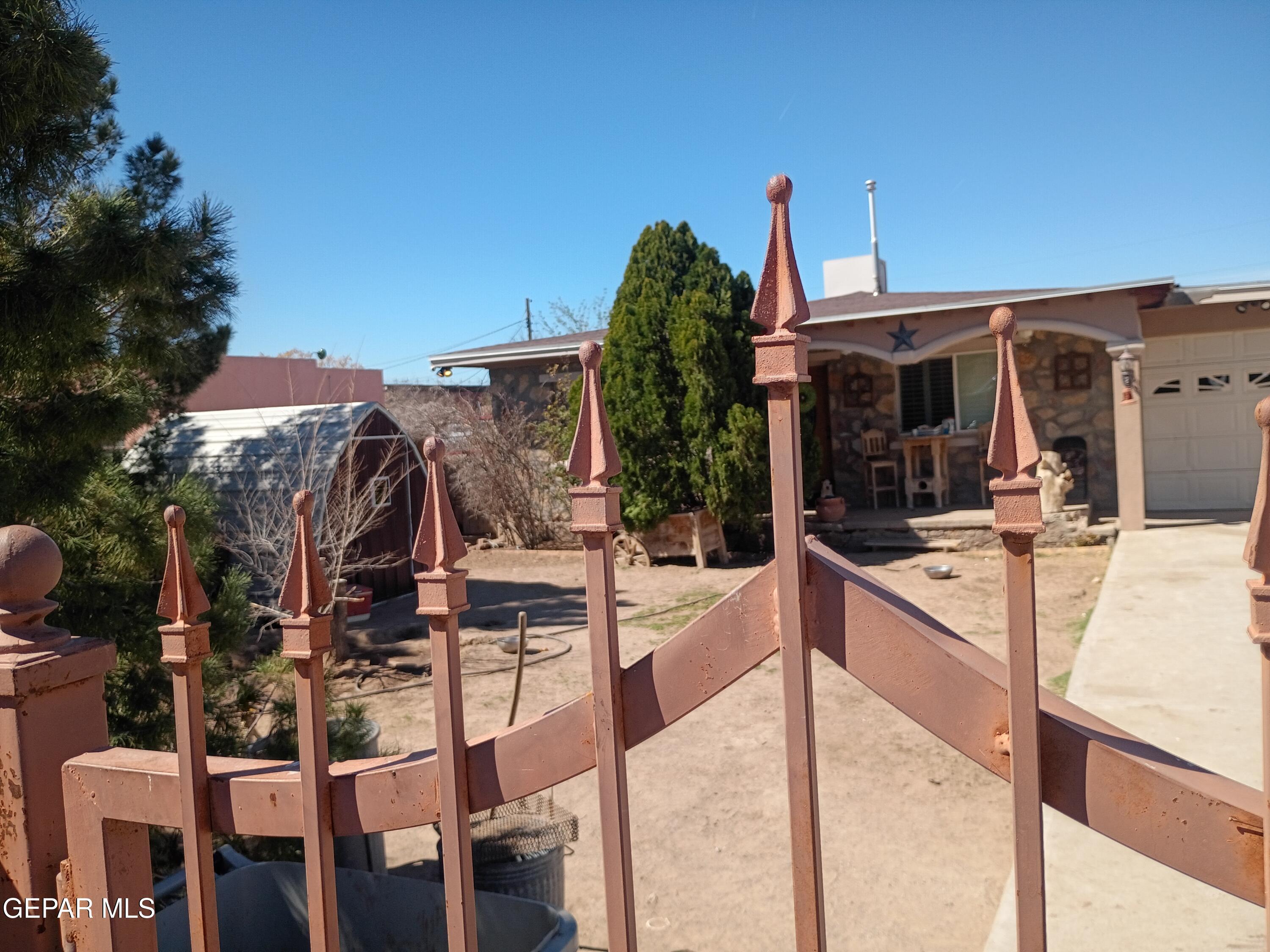 225 Polo Inn Road El Paso, TX 79915 - Photo 11 of 12 a view of a patio with swimming pool