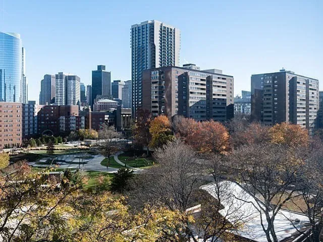 a view of a city with tall buildings