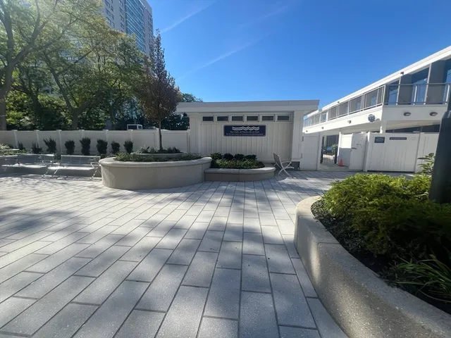 a view of a street with houses on both side