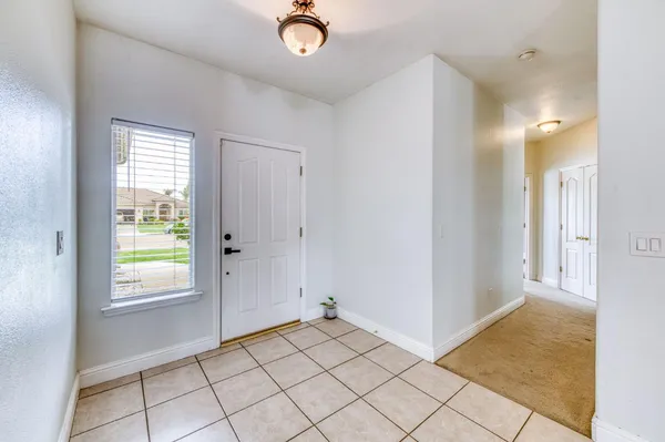 a living room with furniture and a couch