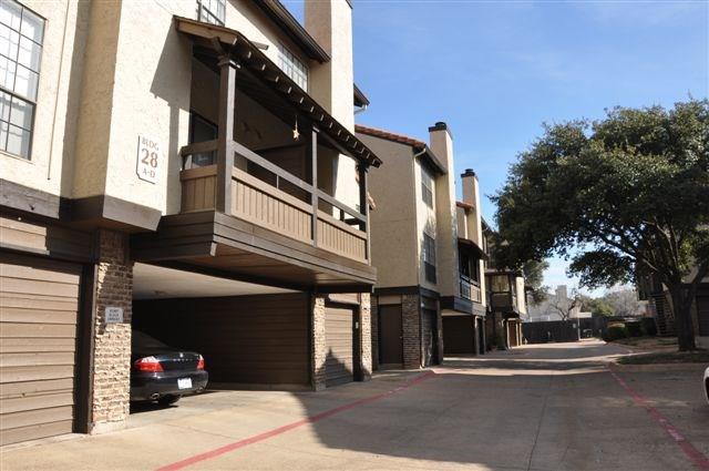 5630 Spring Valley Road, Unit 17A Dallas, TX 75254 - Photo 4 of 14 a view of a building with a street